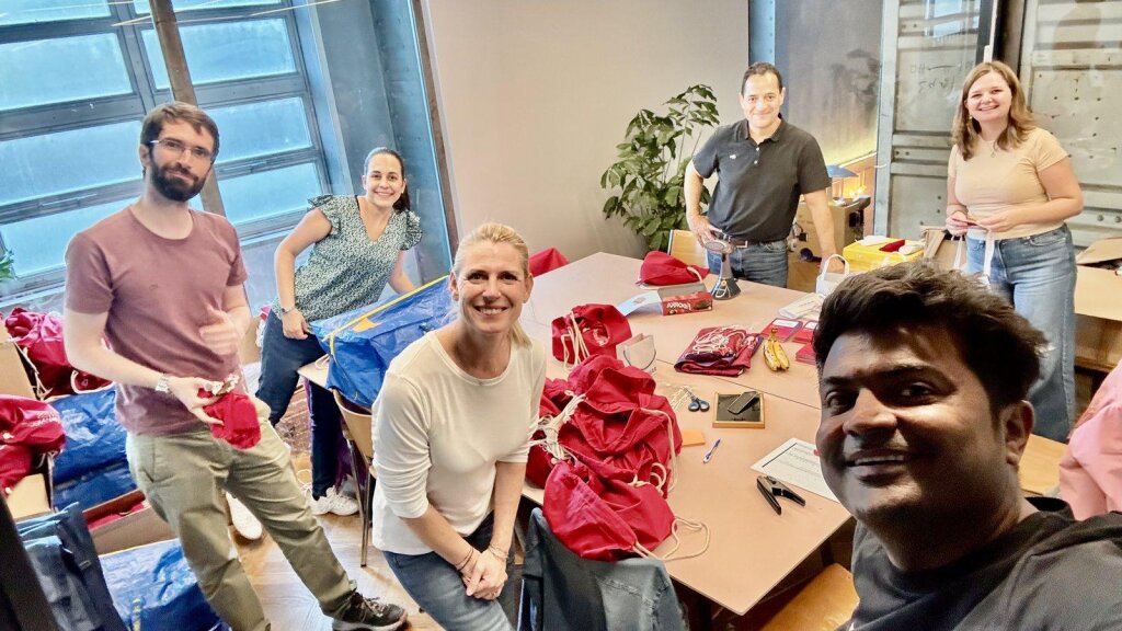 Volunteers packing hacker kits the day before the Zurich Hackathon.