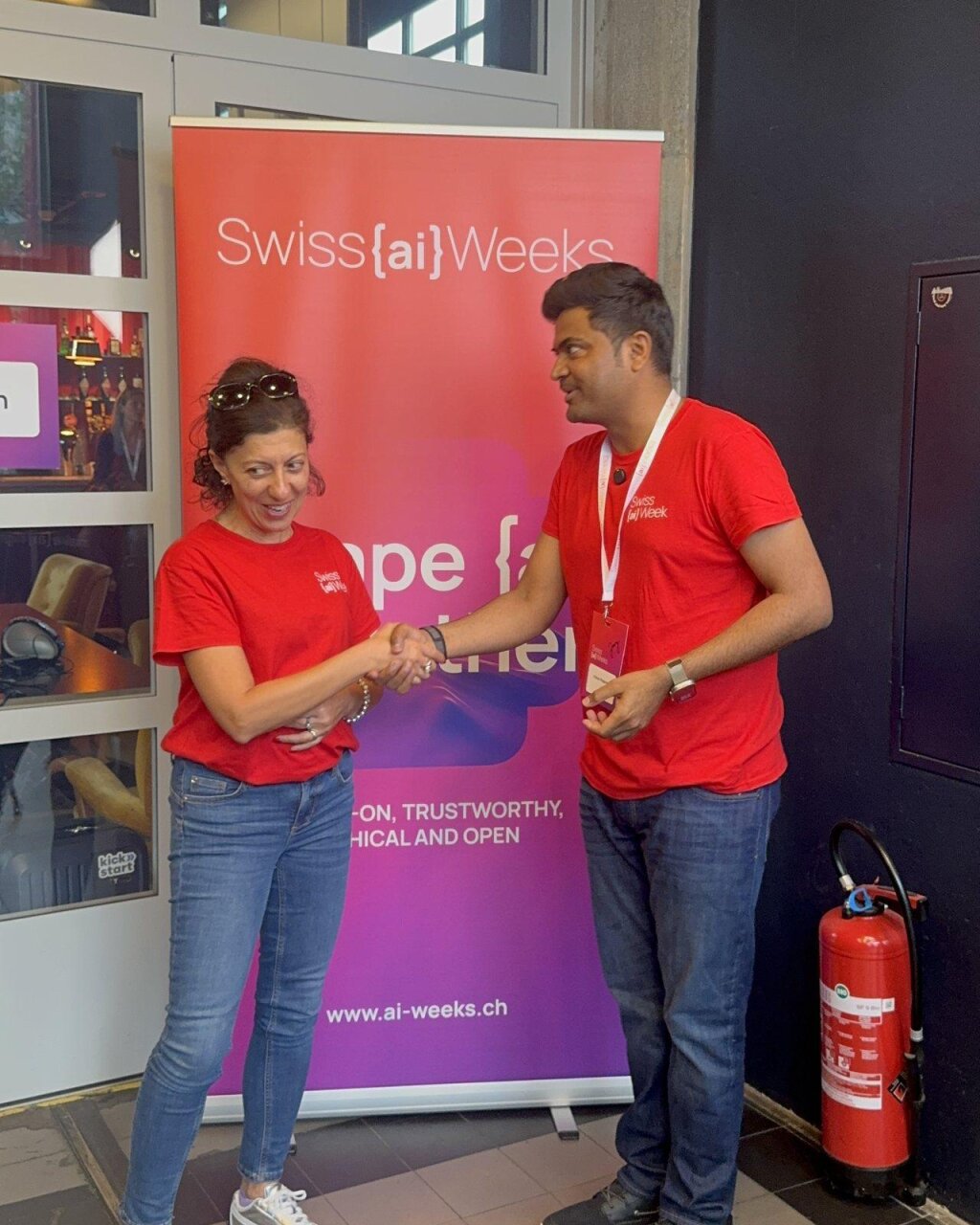A rapid-fire interview in progress at the Swiss {ai} Weeks interview corner.